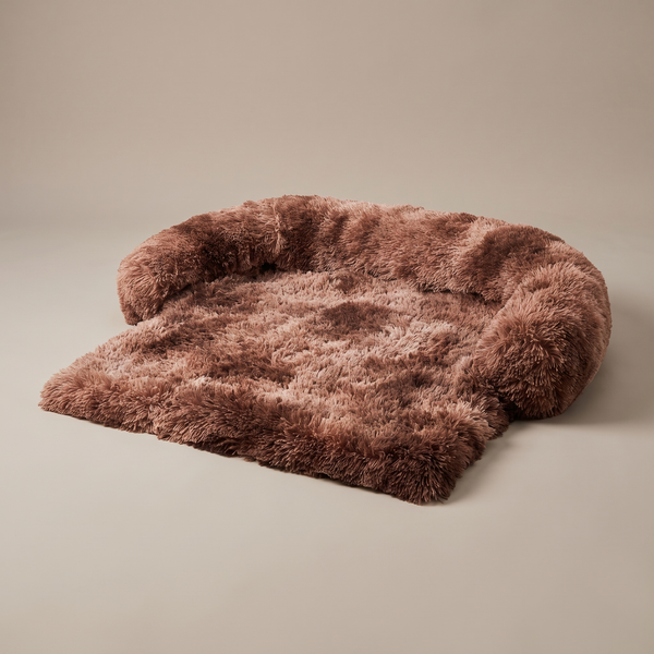 Pawzie Drape sofa cover dog bed in Chocolate, long-pile faux fur with a rolled bolster along the back and sides