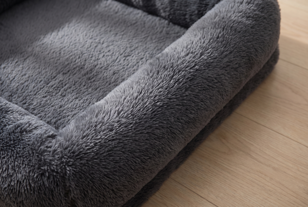 Close detail of the Pawzie Lounge in Dark Gray, where the side bolster meets the sleeping surface