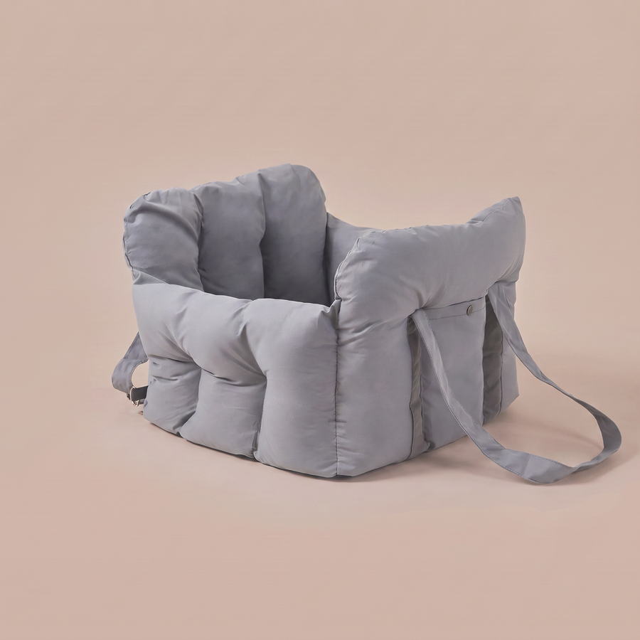 Pawzie Perch dog car booster bed in gray, shown on a plain background with its shoulder carry strap