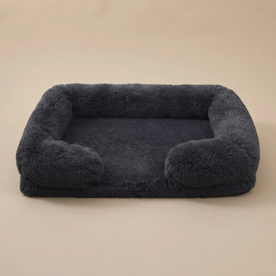 Pawzie Lounge bolstered dog bed in Dark Gray, shown empty on a plain background